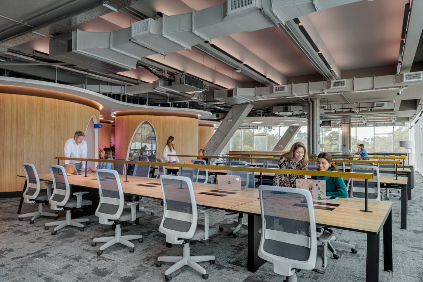 Uala Offices 2024 - Open plan workspace with bench desking and exposed industrial ceilings - Contract Workplaces.jpg